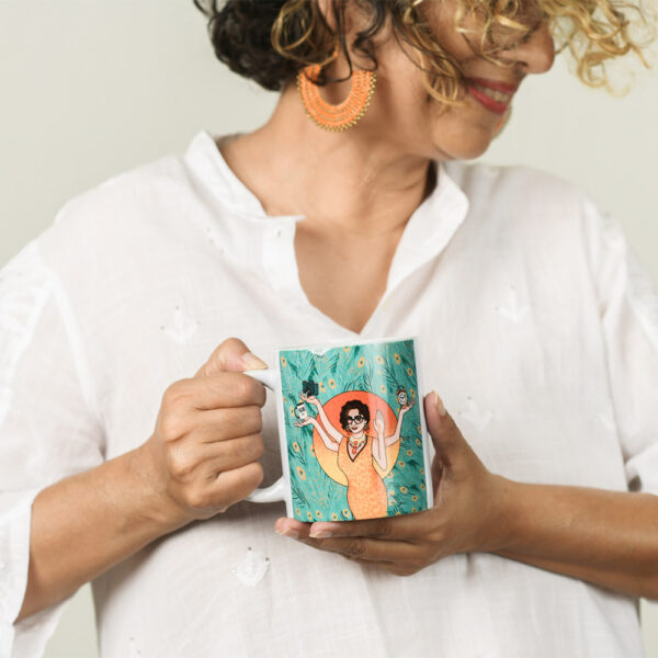 Woman holding goddess mug