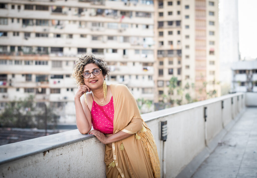 woman in pink outfit in india