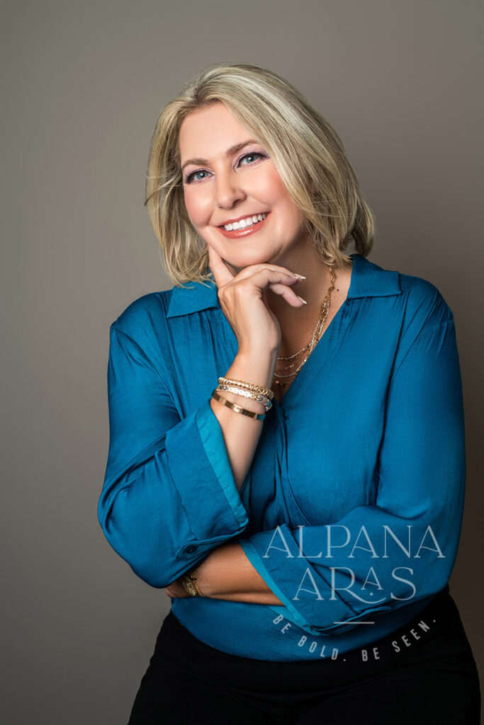 female auctioneer professional studio headshot